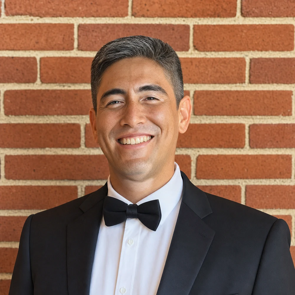 Steve Alcaraz in a formal portrait
